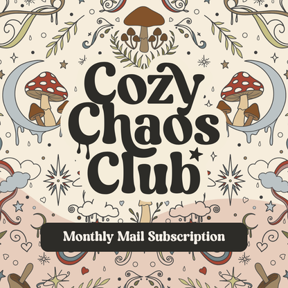 Promotional graphic for a 'Cozy Chaos Club' monthly mail subscription, featuring whimsical hand-drawn illustrations of red and white mushrooms, a crescent moon, stars, and clouds on a cream background, with a black banner at the bottom reading 'Monthly Mail Subscription'.